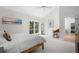 Spacious bedroom with a ceiling fan, carpet floors, double doors and a desk with chair at 2455 The Bent Twig, Seabrook Island, SC 29455