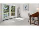 Bright, serene bedroom featuring a balcony overlooking the trees and a desk with chair at 2455 The Bent Twig, Seabrook Island, SC 29455