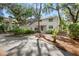 Charming home with well-maintained landscaping and mature trees creating a peaceful atmosphere at 2455 The Bent Twig, Seabrook Island, SC 29455