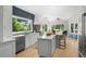 Beautiful kitchen featuring a large window with views of the outdoors and an island with seating at 2455 The Bent Twig, Seabrook Island, SC 29455