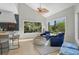 Sitting area featuring comfortable armchairs, lots of natural light, and seamless flow to the kitchen at 2455 The Bent Twig, Seabrook Island, SC 29455