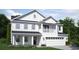 Charming two-story home featuring a welcoming porch, balcony, and attached two car garage at 263 Camellia Bloom Dr, Moncks Corner, SC 29461