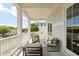Relaxing balcony with comfortable outdoor seating, elegant railings, and plenty of natural light perfect for enjoying the outdoors at 3007 Cameron Blvd, Isle of Palms, SC 29451