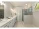 Bathroom featuring double vanity, sleek countertops, and a modern glass-enclosed shower for a spa-like experience at 3007 Cameron Blvd, Isle of Palms, SC 29451