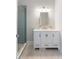 Bathroom boasts a glass enclosed shower and a white vanity with marble countertop at 3007 Cameron Blvd, Isle of Palms, SC 29451