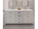 Bathroom vanity with double sinks, marble countertop, and ample storage at 3007 Cameron Blvd, Isle of Palms, SC 29451