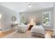 Bright, airy bedroom with two twin beds, ceiling fan, and lots of natural light at 3007 Cameron Blvd, Isle of Palms, SC 29451