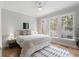 Bright bedroom with large windows and a comfortable bed at 3007 Cameron Blvd, Isle of Palms, SC 29451