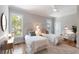 Bright, airy bedroom with two twin beds, ceiling fan, and lots of natural light at 3007 Cameron Blvd, Isle of Palms, SC 29451