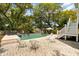 Inviting backyard pool with in-ground spa and lounge chairs, creating a serene oasis for relaxation and entertainment at 3007 Cameron Blvd, Isle of Palms, SC 29451