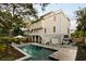 Luxury raised beach house featuring private backyard pool, outdoor living space, and charming curb appeal at 3007 Cameron Blvd, Isle of Palms, SC 29451