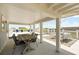 Expansive rooftop deck features outdoor dining and lounge areas, offering stunning views for relaxing and entertaining guests at 3007 Cameron Blvd, Isle of Palms, SC 29451