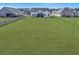 A huge backyard that offers privacy and serenity while complementing the home's exterior at 308 Cypress Branch Rd, Huger, SC 29450