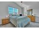 Bright bedroom featuring a large window and light wooden bedroom furniture at 308 Cypress Branch Rd, Huger, SC 29450
