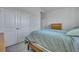 Bright bedroom featuring white walls and a double door closet at 308 Cypress Branch Rd, Huger, SC 29450