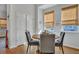 Bright dining space with natural window shades and seating for four at 308 Cypress Branch Rd, Huger, SC 29450