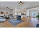 Bright living room showcasing hardwood floors, natural light, and an open-concept design at 308 Cypress Branch Rd, Huger, SC 29450