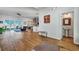Bright living room showcasing hardwood floors, natural light, and an open-concept design at 308 Cypress Branch Rd, Huger, SC 29450