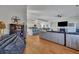 Bright living room showcasing hardwood floors, natural light, and an open-concept design at 308 Cypress Branch Rd, Huger, SC 29450