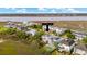 Beautiful home on the water with a pool in the backyard and gorgeous landscaping at 3107 S Shore Dr, Charleston, SC 29407