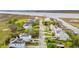 Wide aerial view showcasing a waterfront neighborhood, green space, and convenient boat access at 3107 S Shore Dr, Charleston, SC 29407