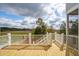 Wooden deck overlooking serene marshland; the perfect spot for outdoor relaxation at 3107 S Shore Dr, Charleston, SC 29407