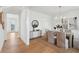 Bright dining room with stylish decor, a modern chandelier, and ample seating at 3107 S Shore Dr, Charleston, SC 29407