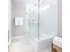 Contemporary walk-in shower with glass enclosure, sleek fixtures, and white subway tiles offering a spa-like experience at 320 Archar St, Summerville, SC 29486