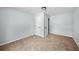 This is a bedroom with neutral carpeting and pale gray walls at 3227 Stonehaven Dr, North Charleston, SC 29420