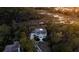Beautiful aerial view of two story home surrounded by trees, marsh, and community at 3547 Holmgren St, Mount Pleasant, SC 29466