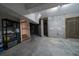 Unfinished basement with concrete floor, storage shelves, block wall, and utility connections at 3547 Holmgren St, Mount Pleasant, SC 29466