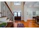 Grand foyer featuring hardwood floors, staircase, and front doors at 3547 Holmgren St, Mount Pleasant, SC 29466