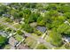 Aerial perspective of the home surrounded by lush landscaping in a well-established neighborhood at 405 Cross St, Charleston, SC 29407