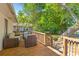 Outdoor deck perfect for entertaining features outdoor seating and string lights at 405 Cross St, Charleston, SC 29407