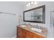 Bathroom features double vanity with granite countertops and a glass enclosed shower at 405 Cross St, Charleston, SC 29407