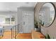 Inviting foyer with hardwood floors, modern decor, and natural light at 405 Cross St, Charleston, SC 29407