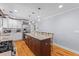 Gourmet kitchen with center island, stainless steel appliances, and custom cabinetry at 405 Cross St, Charleston, SC 29407