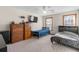 Bedroom with carpet flooring, ceiling fan, and two twin beds at 406 King Charles Cir, Summerville, SC 29485