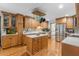 Spacious eat-in kitchen with stainless steel appliances and a center island offering additional counter space at 406 King Charles Cir, Summerville, SC 29485