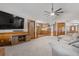 Open floor plan featuring a living room with hardwood floors and a fireplace that leads to a kitchen at 406 King Charles Cir, Summerville, SC 29485
