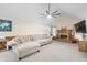 Comfortable living room featuring a fireplace, vaulted ceiling, and lots of natural light at 406 King Charles Cir, Summerville, SC 29485