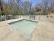 Community pool offers separate areas for adults and surrounded by tables and chairs at 406 King Charles Cir, Summerville, SC 29485