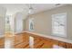 Bedroom featuring hardwood floors, white trim, neutral walls, natural light, and a ceiling fan at 41 Jane Jacobs St, Mount Pleasant, SC 29464