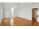 Spacious bedroom with hardwood floors, white ceilings, white trim, and a ceiling fan for comfort at 41 Jane Jacobs St, Mount Pleasant, SC 29464