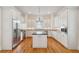 Beautiful, fully-equipped kitchen with stainless steel appliances and white cabinetry at 41 Jane Jacobs St, Mount Pleasant, SC 29464