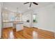 Spacious kitchen with white cabinets, granite countertops, island, and stainless steel appliances at 41 Jane Jacobs St, Mount Pleasant, SC 29464