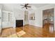Spacious living room with fireplace, hardwood floors, and custom built-ins at 41 Jane Jacobs St, Mount Pleasant, SC 29464