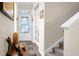 Elegant foyer with hardwood floors and stairway at 411 Freeland Way, Moncks Corner, SC 29461