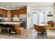 Well-equipped kitchen with a large island, stainless steel appliances, and a dining area nearby at 411 Freeland Way, Moncks Corner, SC 29461