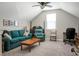 Cozy living room with comfortable seating and a ceiling fan, creating a relaxing atmosphere at 411 Freeland Way, Moncks Corner, SC 29461